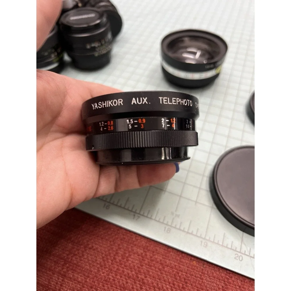 Chinon DSL 35mm SLR Camera With Multiple Lens Untested